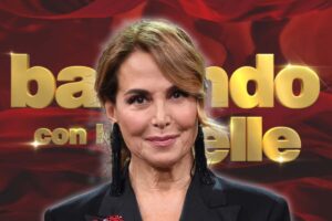 barbara d'urso in primo piano e logo ballndo con le stelle